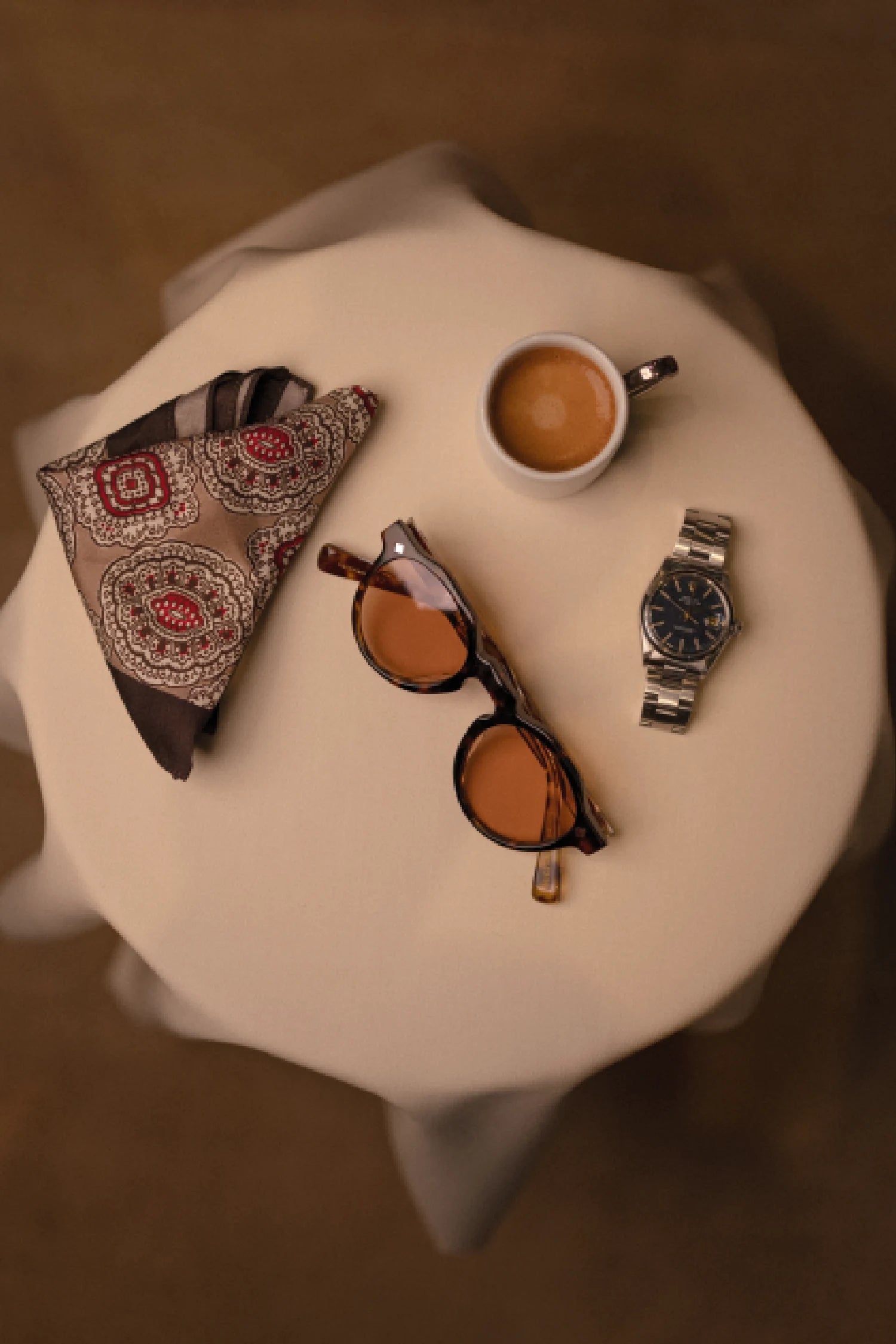 Refined menswear by Osman Abdul Razak Italian acetate sunglasses with transitional amber lenses