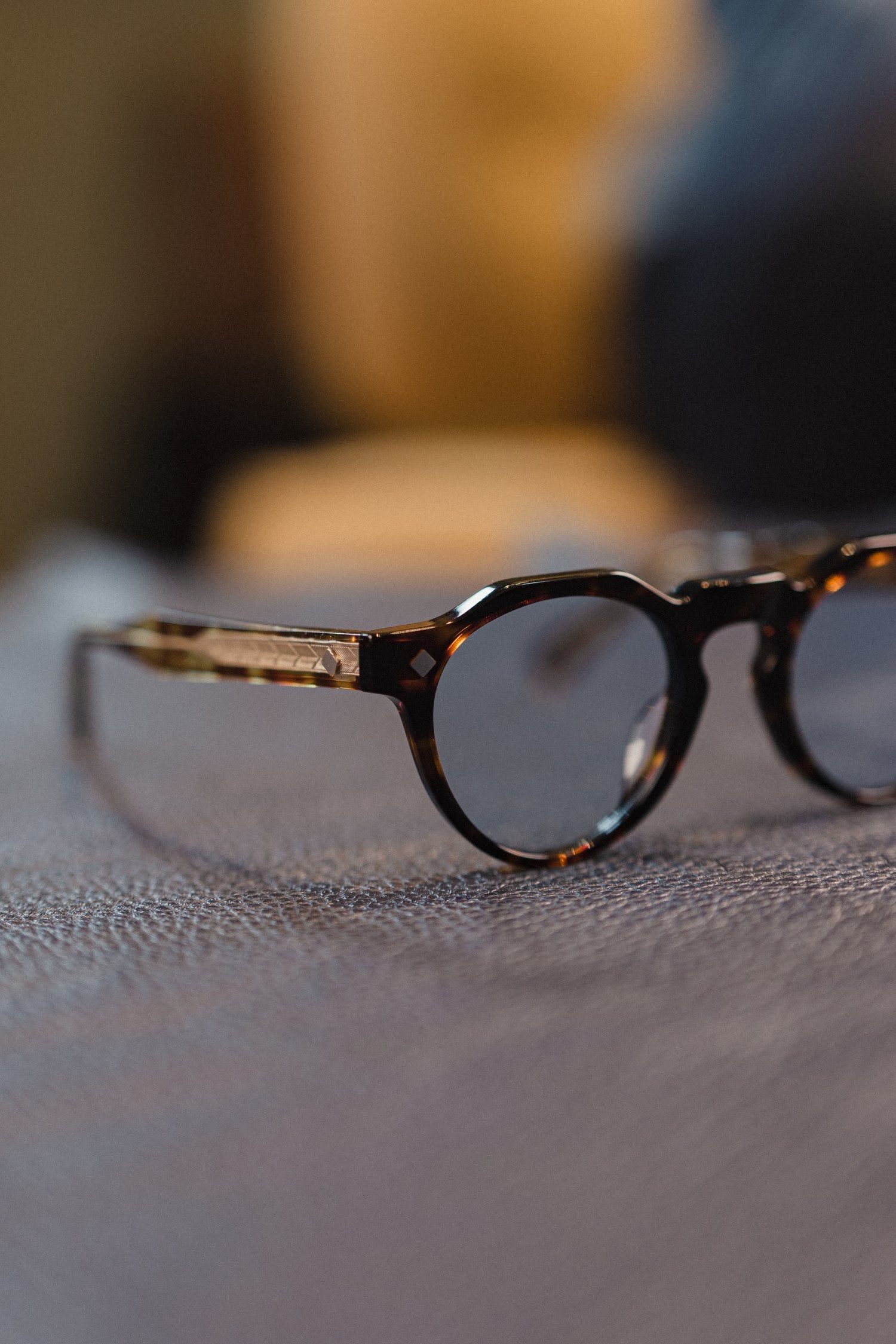 Refined menswear by Osman Abdul Razak Italian acetate sunglasses with smoked blue gradient finish