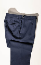 ailored elegance in Osman Abdul Razak menswear – deep navy trousers for versatile dressing