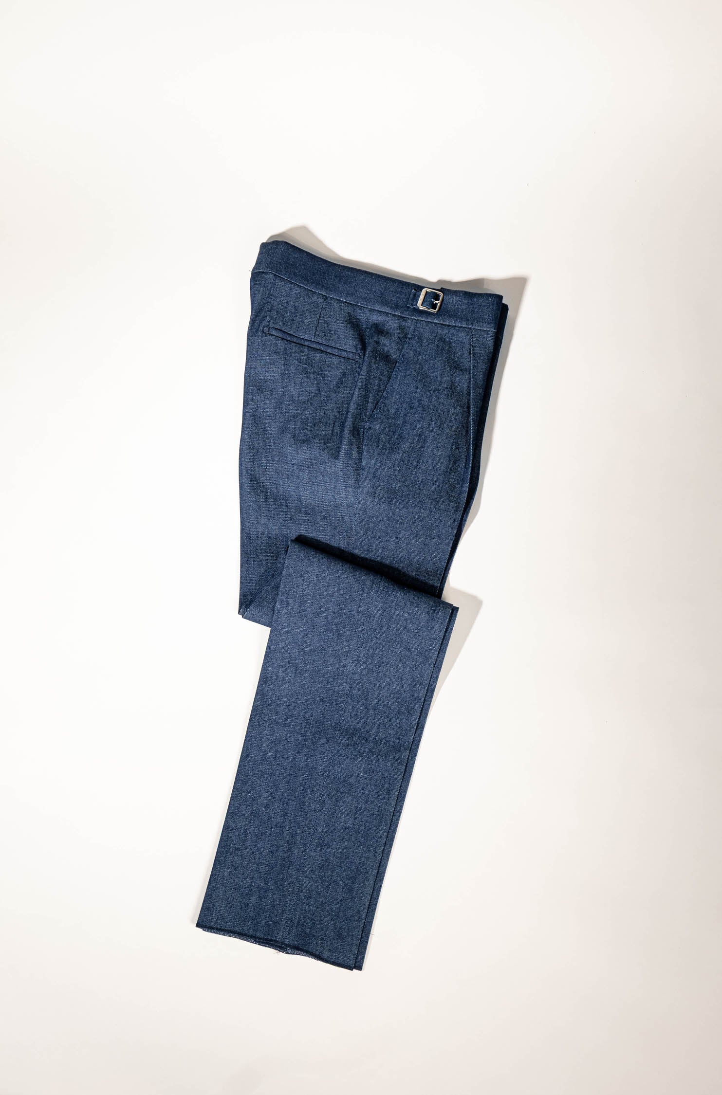 Osman Abdul Razak menswear – Denim Madras Trouser with soft pleat, relaxed leg, and centre crease