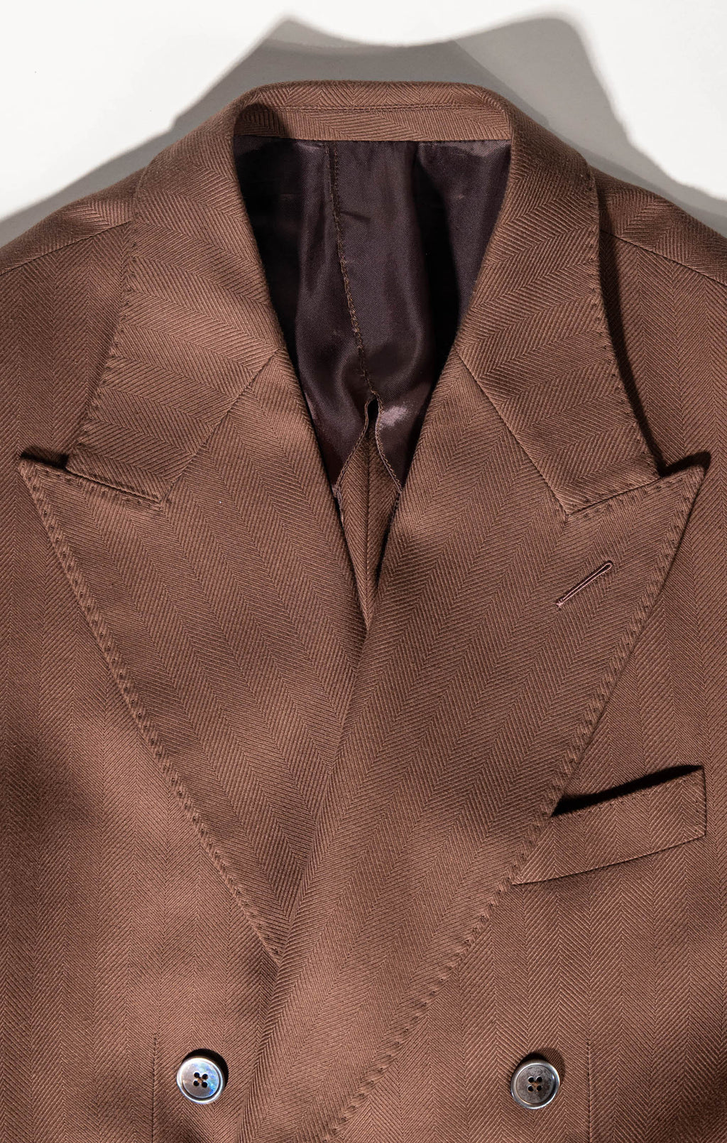 Structured elegance in Osman Abdul Razak menswear – six-button double-breasted jacket