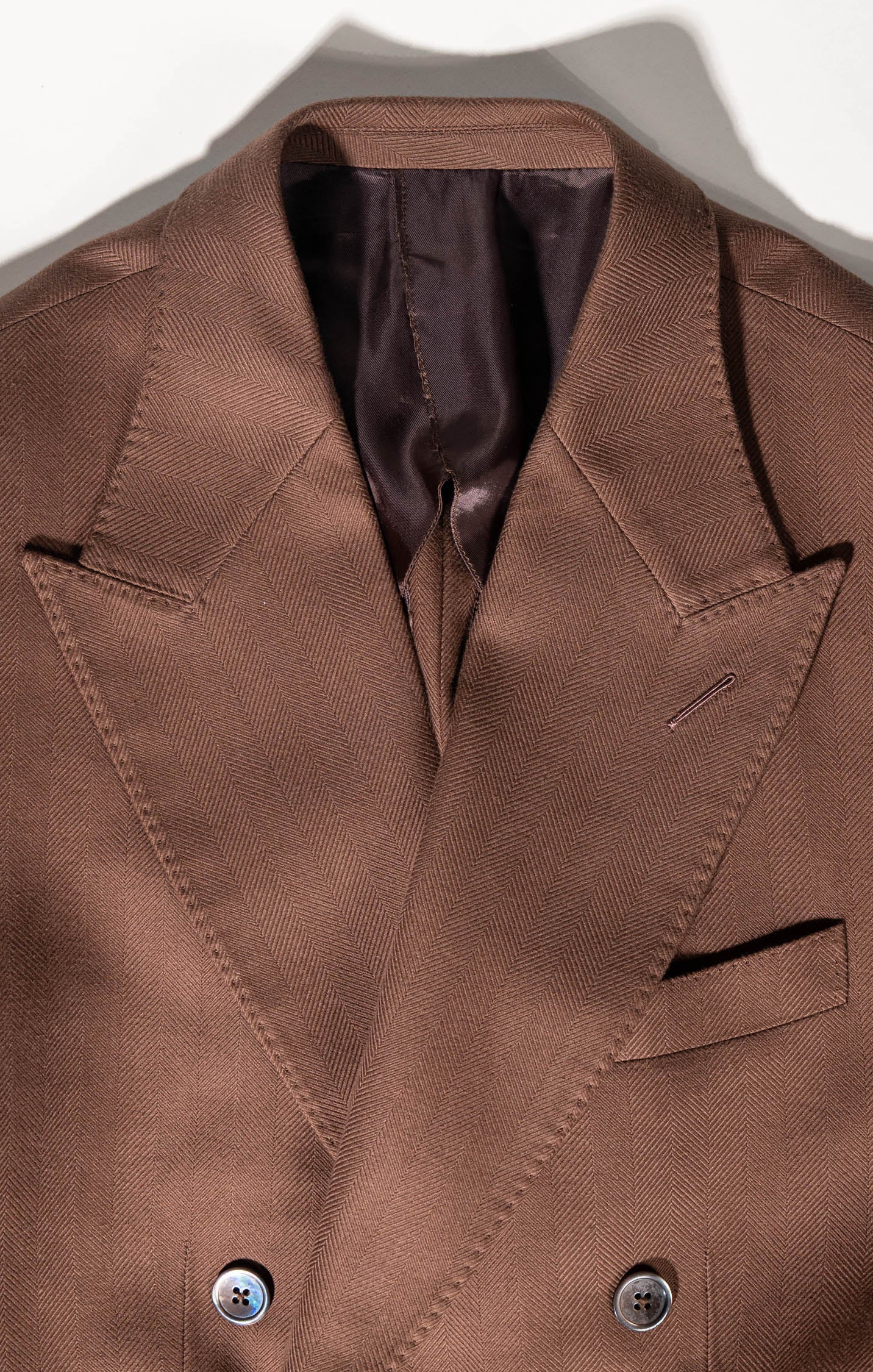 Structured elegance in Osman Abdul Razak menswear – six-button double-breasted jacket