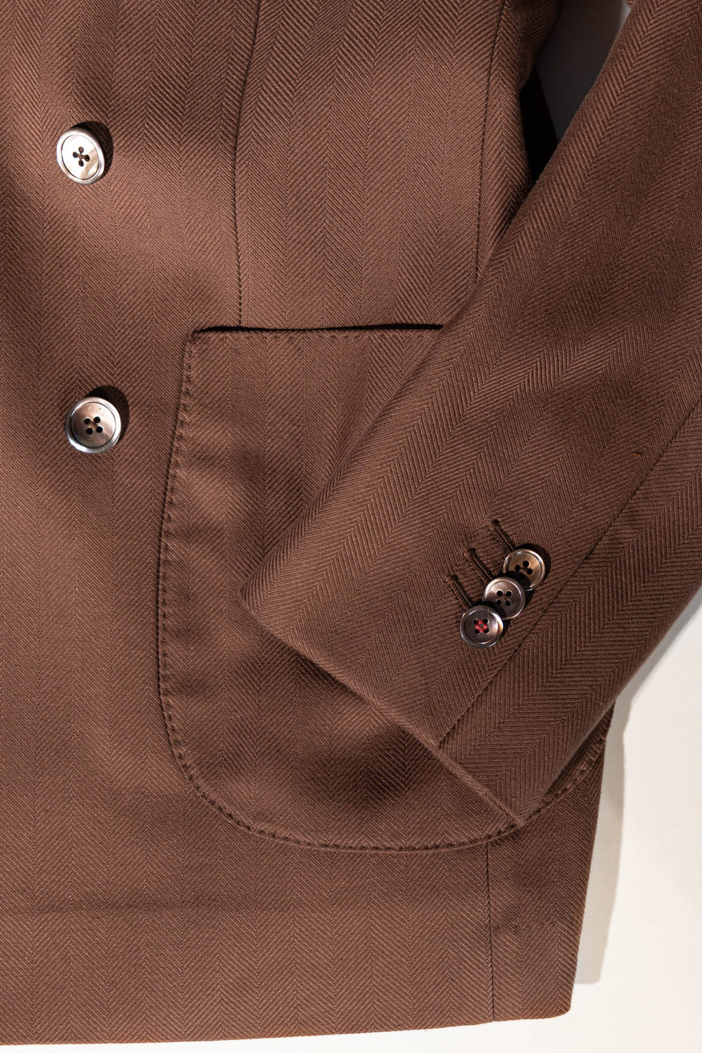 Osman Abdul Razak menswear – ceremonial brown jacket with 3-button sleeve detailing