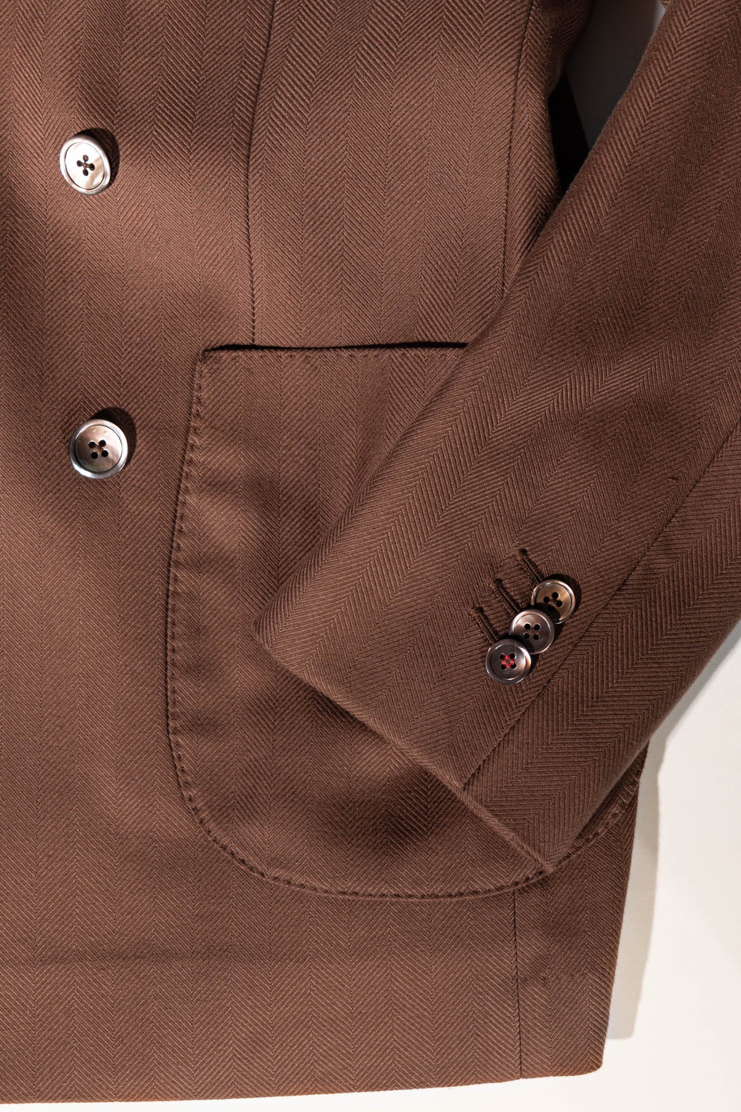 Osman Abdul Razak menswear – ceremonial brown jacket with 3-button sleeve detailing