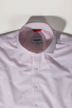 Tailored menswear by Osman Abdul Razak pink stripe shirt versatile for refined everyday style