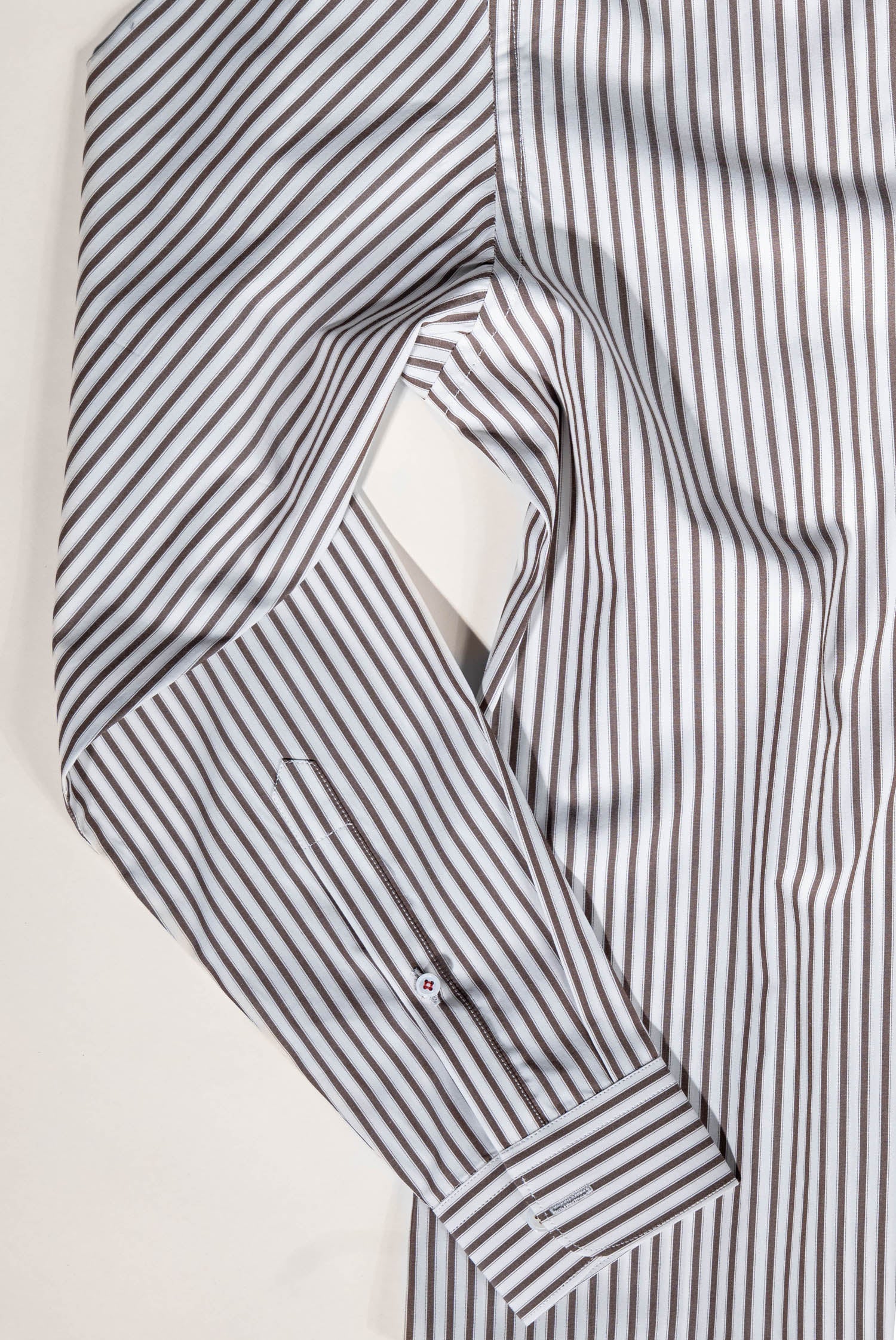 Osman Abdul Razak menswear – Bengal stripe classic shirt pairing confidently with deep-toned trousers or neutral jackets