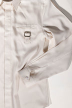 Osman Abdul Razak menswear – Tab Shirt in ivory and beige with metal-tabbed pocket, styled with tailored Madras Shorts