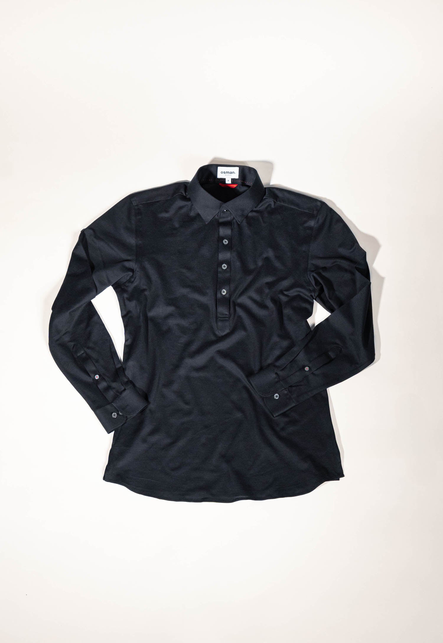 Osman Abdul Razak menswear – refined knit shirt with minimal half placket and house collar construction