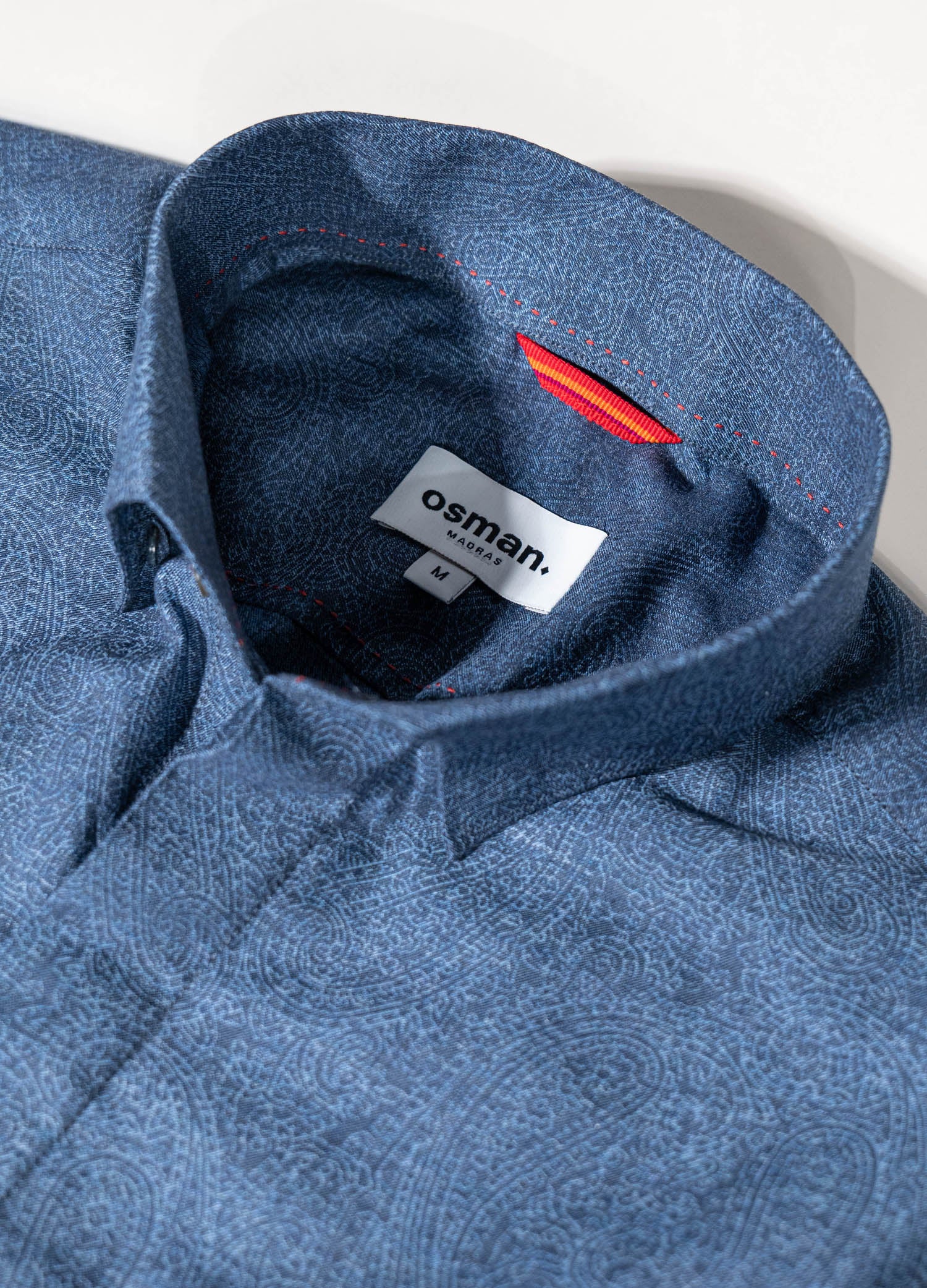 Osman Abdul Razak menswear – elegant blue dress shirt with understated paisley for versatile styling
