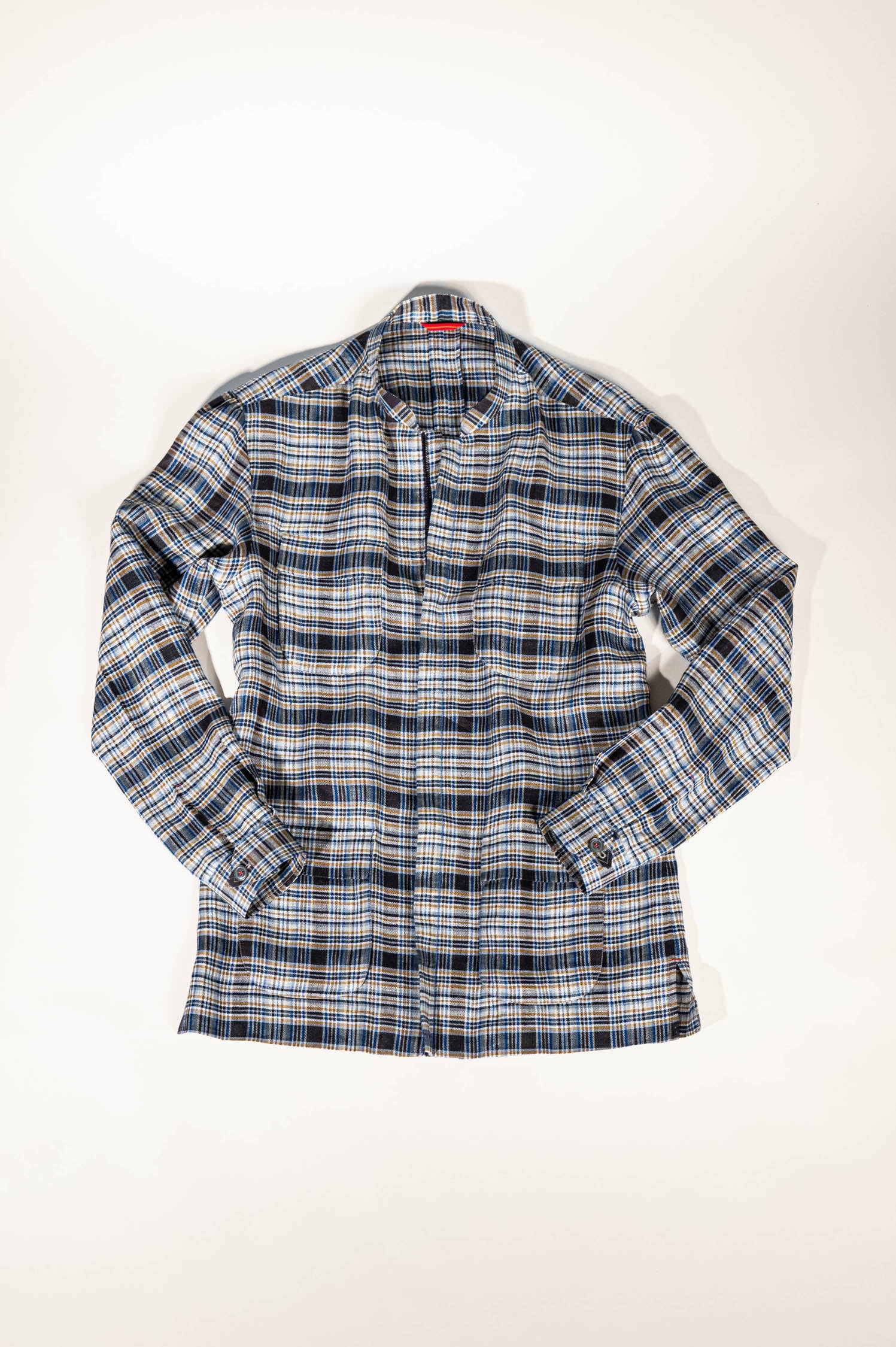 Tailored menswear by Osman Abdul Razak – utilitarian-inspired Madras Check Jacket with quilted half-belt