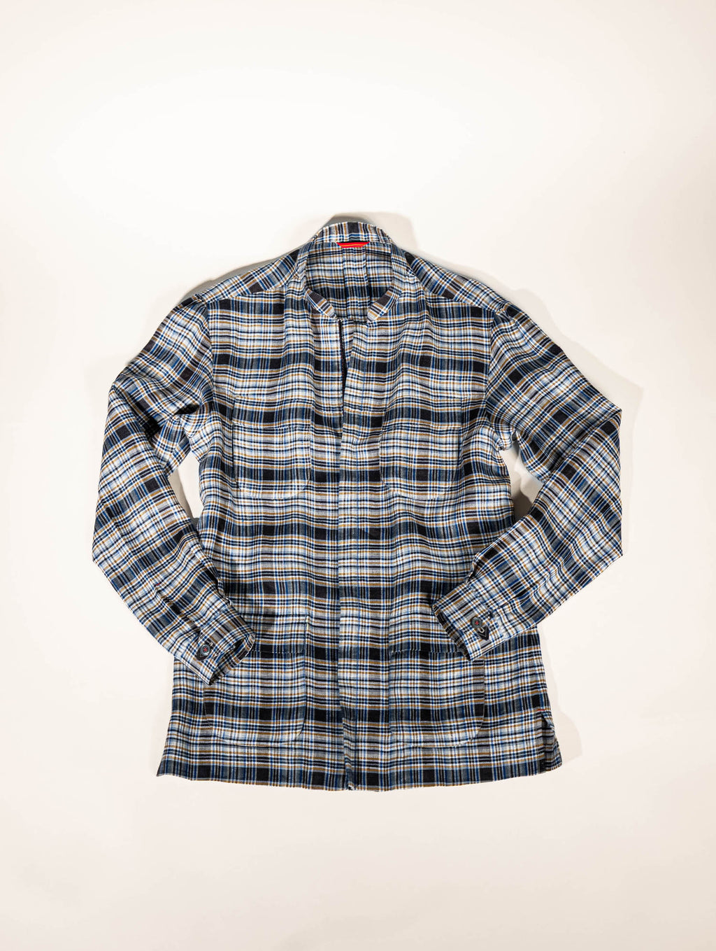 Osman Abdul Razak menswear – structured yet versatile Field Jacket with red stitch accents and shoulder pleats