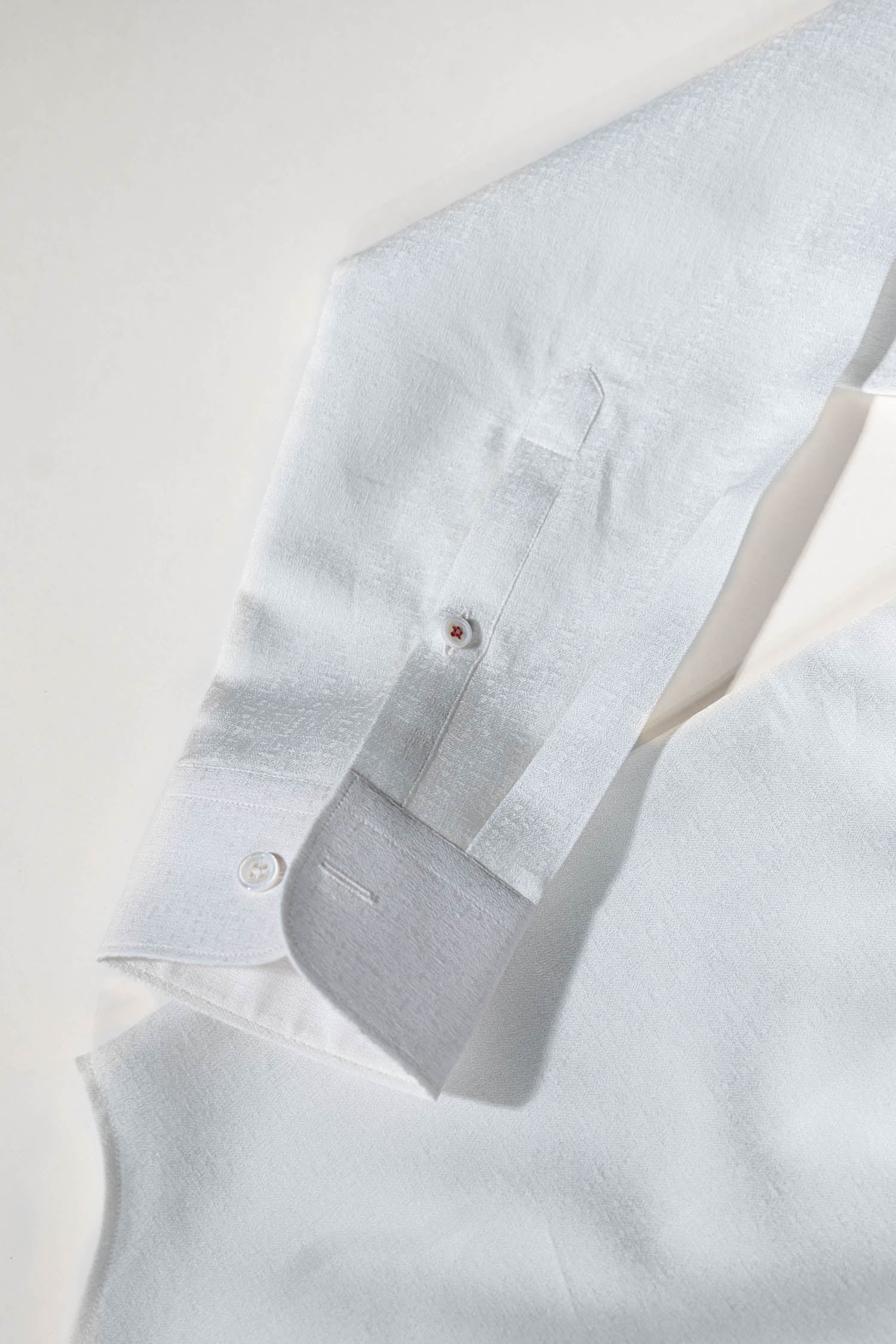 Osman Abdul Razak menswear – polished ivory gala shirt designed for jackets or tailored trousers