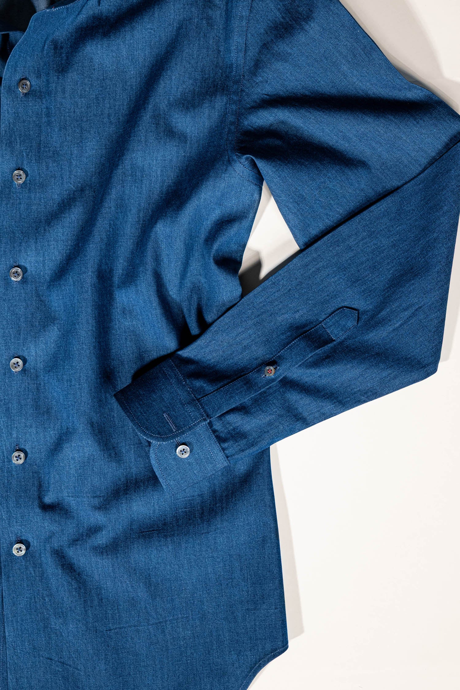 Refined menswear by Osman Abdul Razak Madras Shirt blending movement softness and modern nostalgia