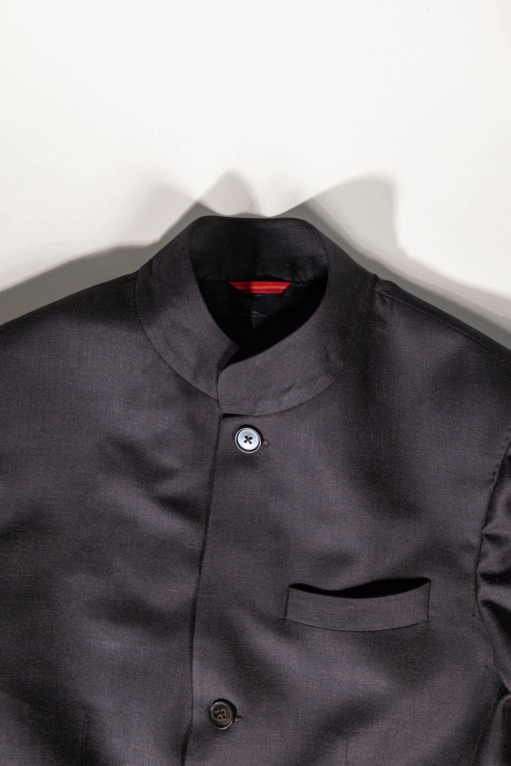 Osman Abdul Razak menswear Gala Jacket in bitter chocolate brown with rounded collar and arrowhead cuffs