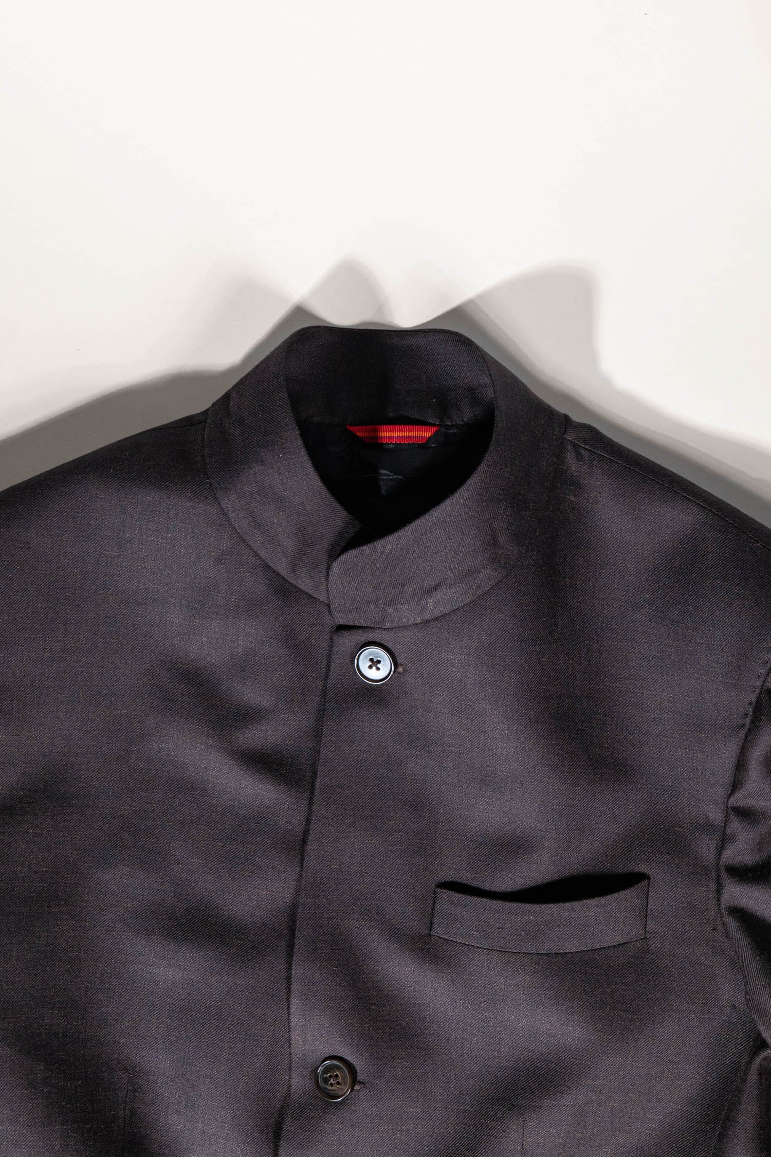 Osman Abdul Razak menswear Gala Jacket in bitter chocolate brown with rounded collar and arrowhead cuffs