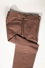 Refined menswear by Osman Abdul Razak – sun-warmed cinnamon trousers for versatile styling