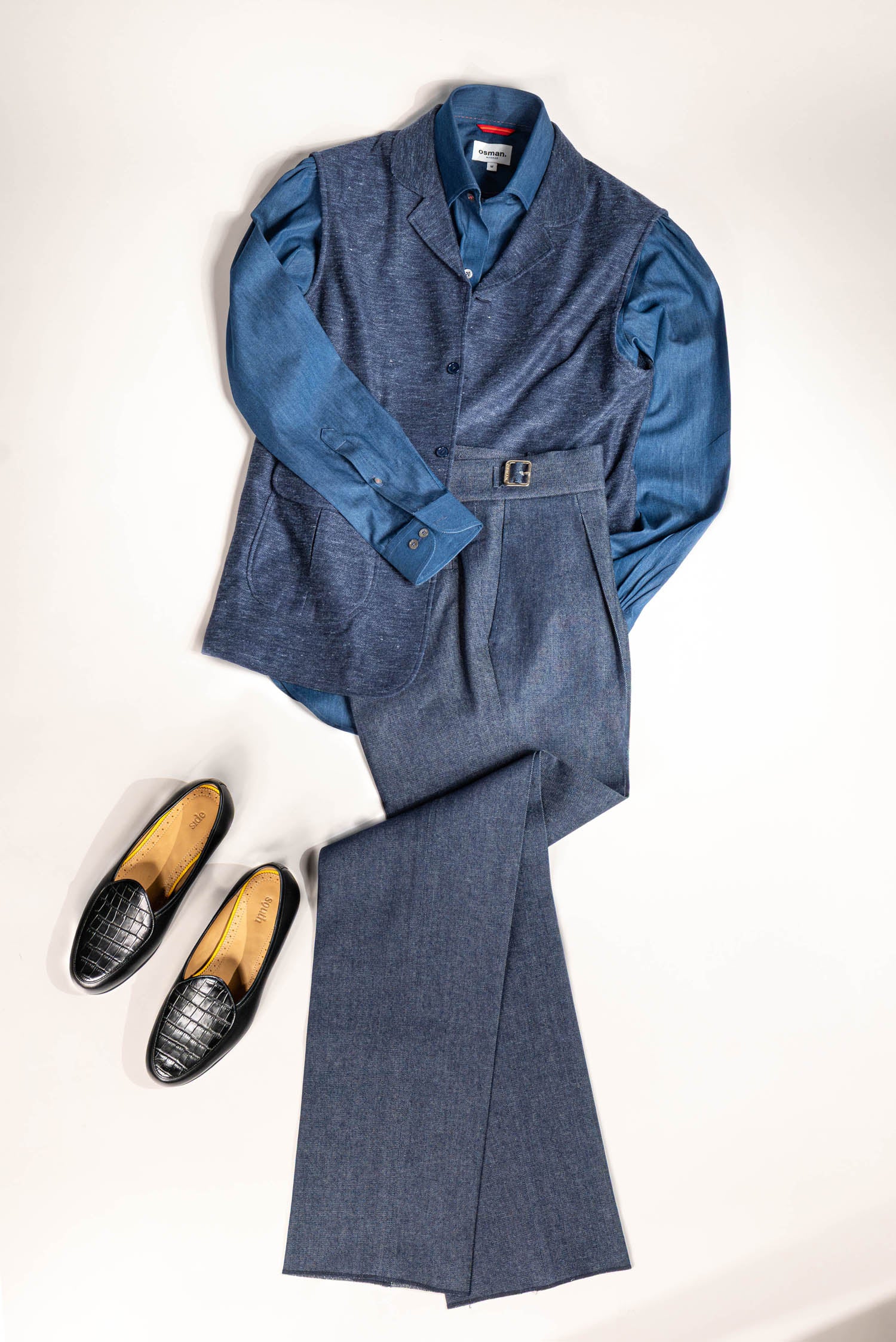 Osman Abdul Razak menswear – elegant navy gilet pairing seamlessly with tonal and neutral dressing