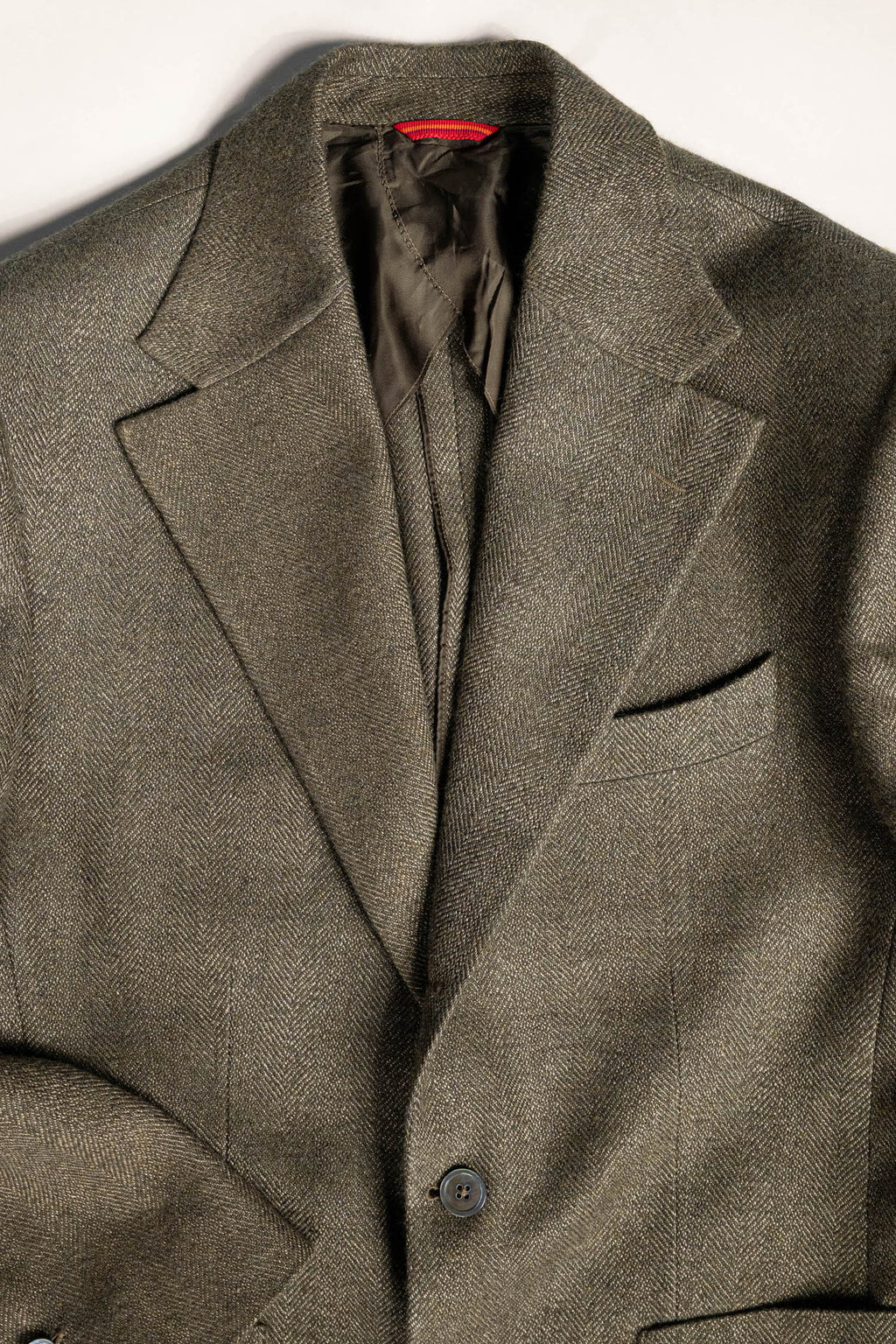 Osman Abdul Razak menswear tailored three button jacket half lined in self fabric for breathability