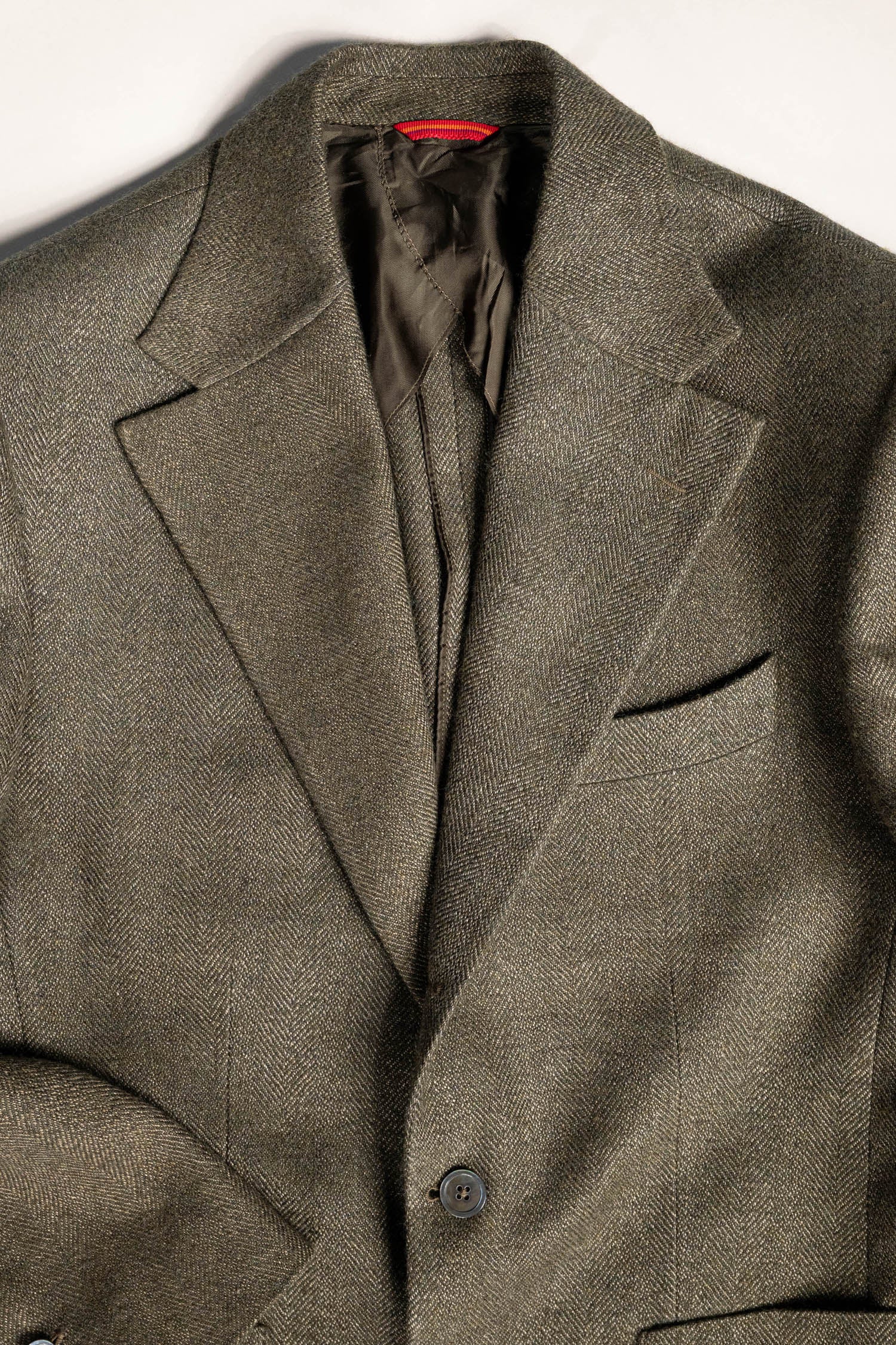 Osman Abdul Razak menswear tailored three button jacket half lined in self fabric for breathability