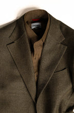Elegant menswear by Osman Abdul Razak olive herringbone jacket designed as a modern tailoring staple
