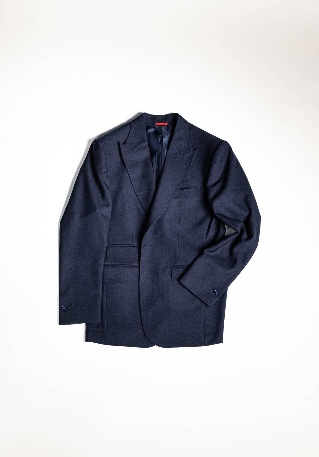 Osman Abdul Razak menswear Classic Single Breasted Jacket in navy with high peak lapel and soft tailoring