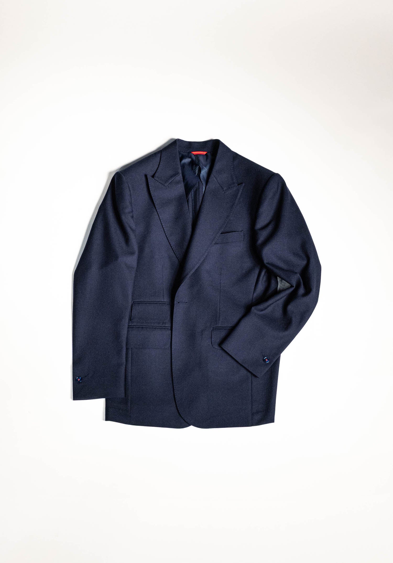 Osman Abdul Razak menswear Classic Single Breasted Jacket in navy with high peak lapel and soft tailoring