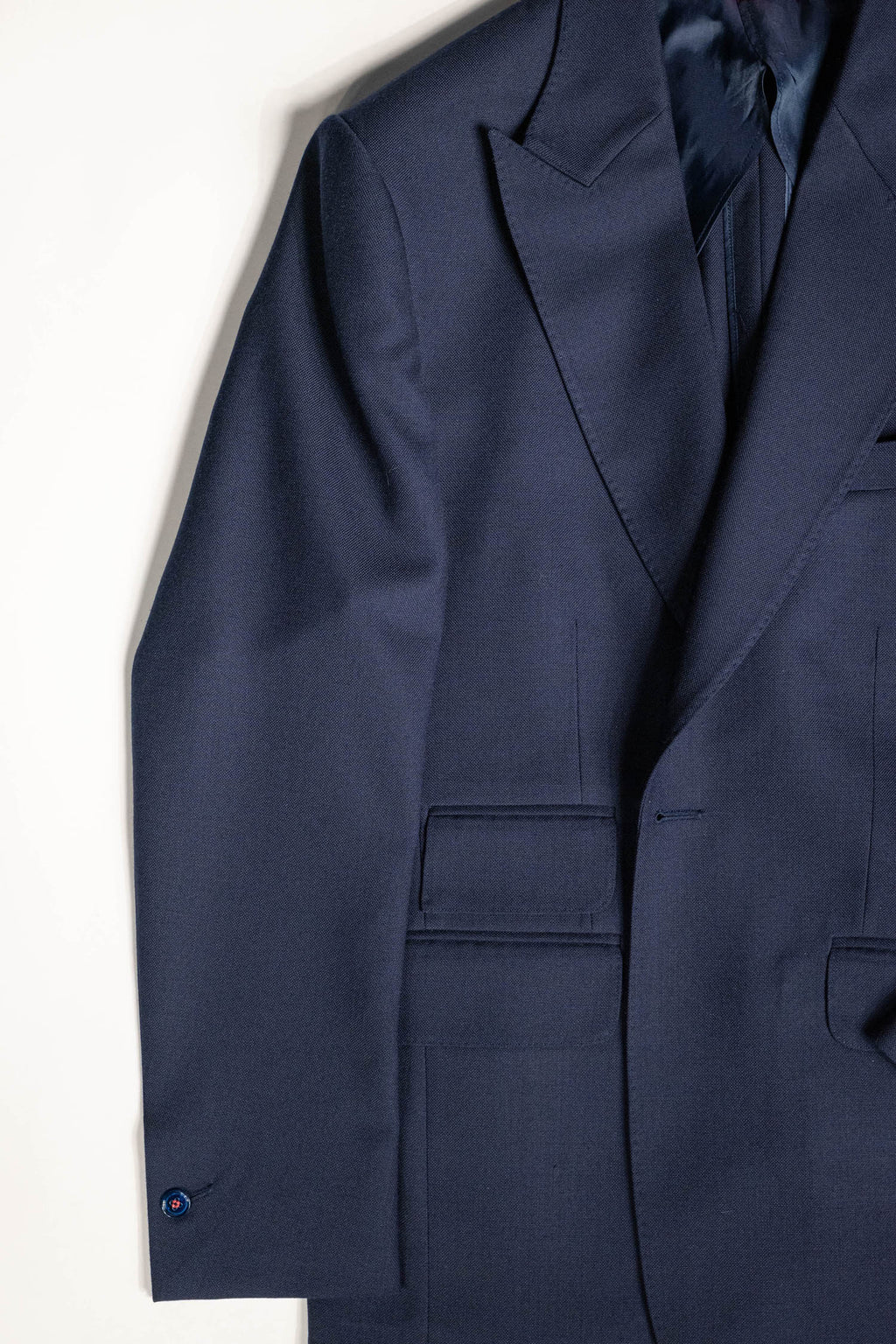 Tailored menswear by Osman Abdul Razak Classic Single Breasted Jacket with elongated silhouette and double slit