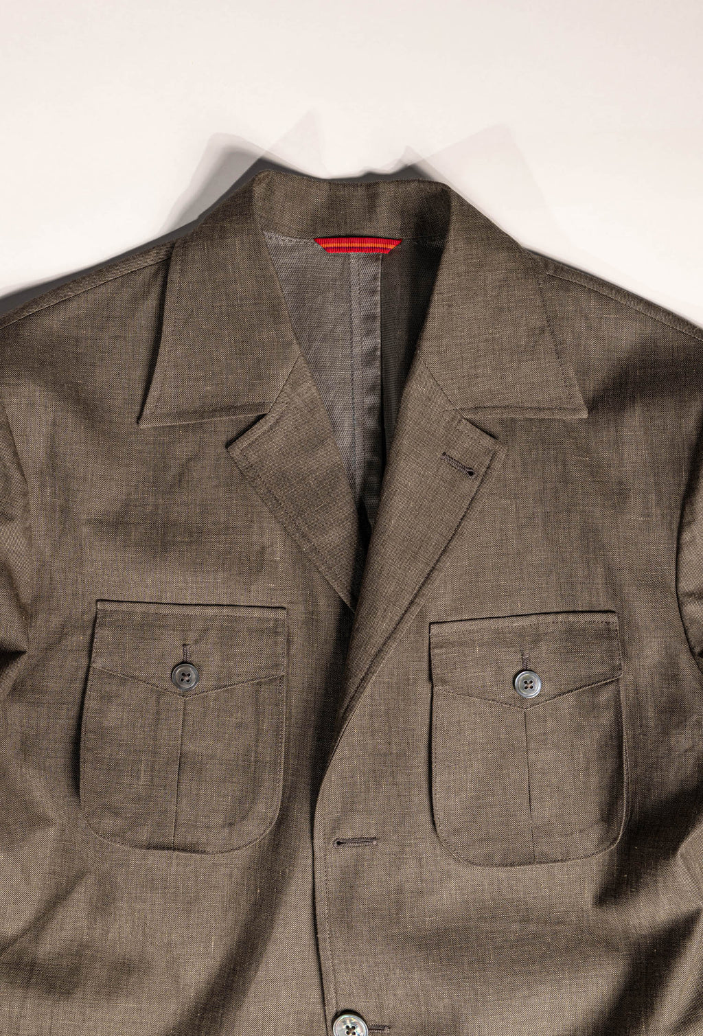 Osman Abdul Razak menswear Sahariana jacket with quilted belt wide notch lapels and three button closure