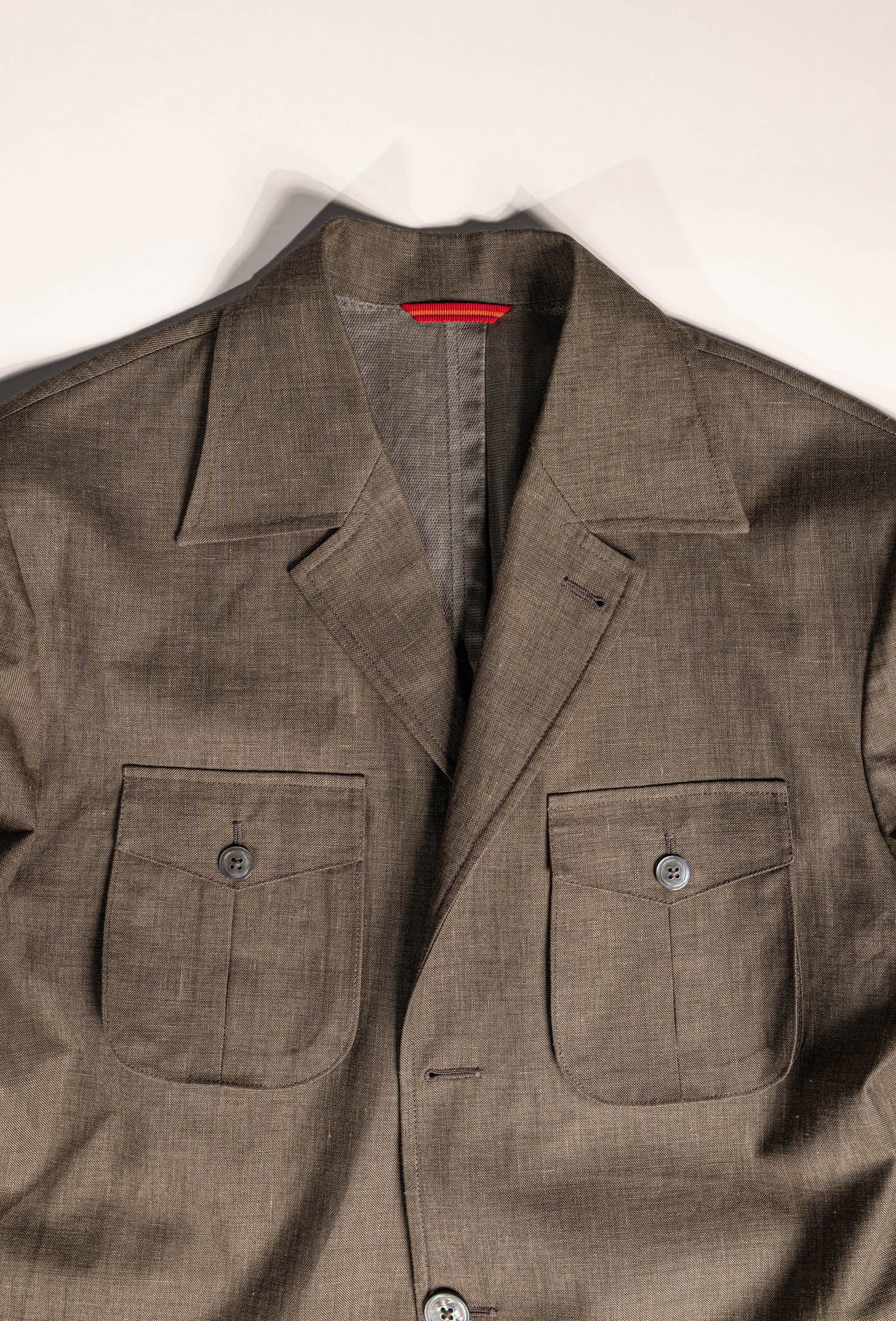 Osman Abdul Razak menswear Sahariana jacket with quilted belt wide notch lapels and three button closure