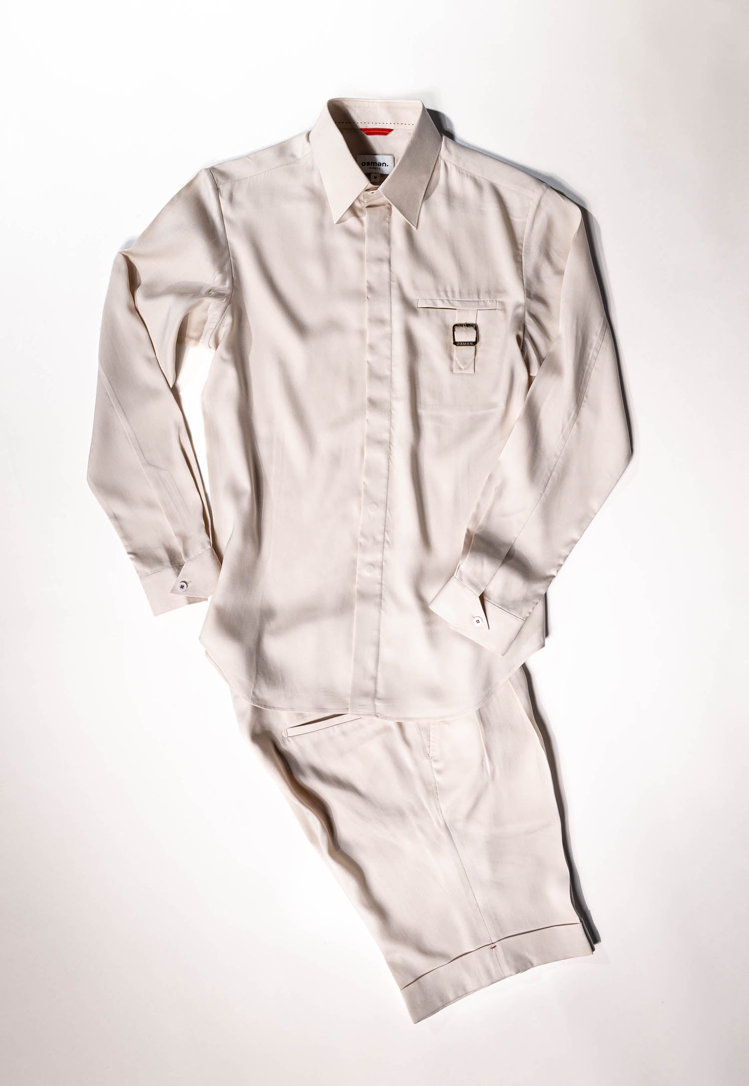 Refined menswear by Osman Abdul Razak – co-ord set featuring Tab Shirt with pointed collar and breathable Ivory Madras Shorts