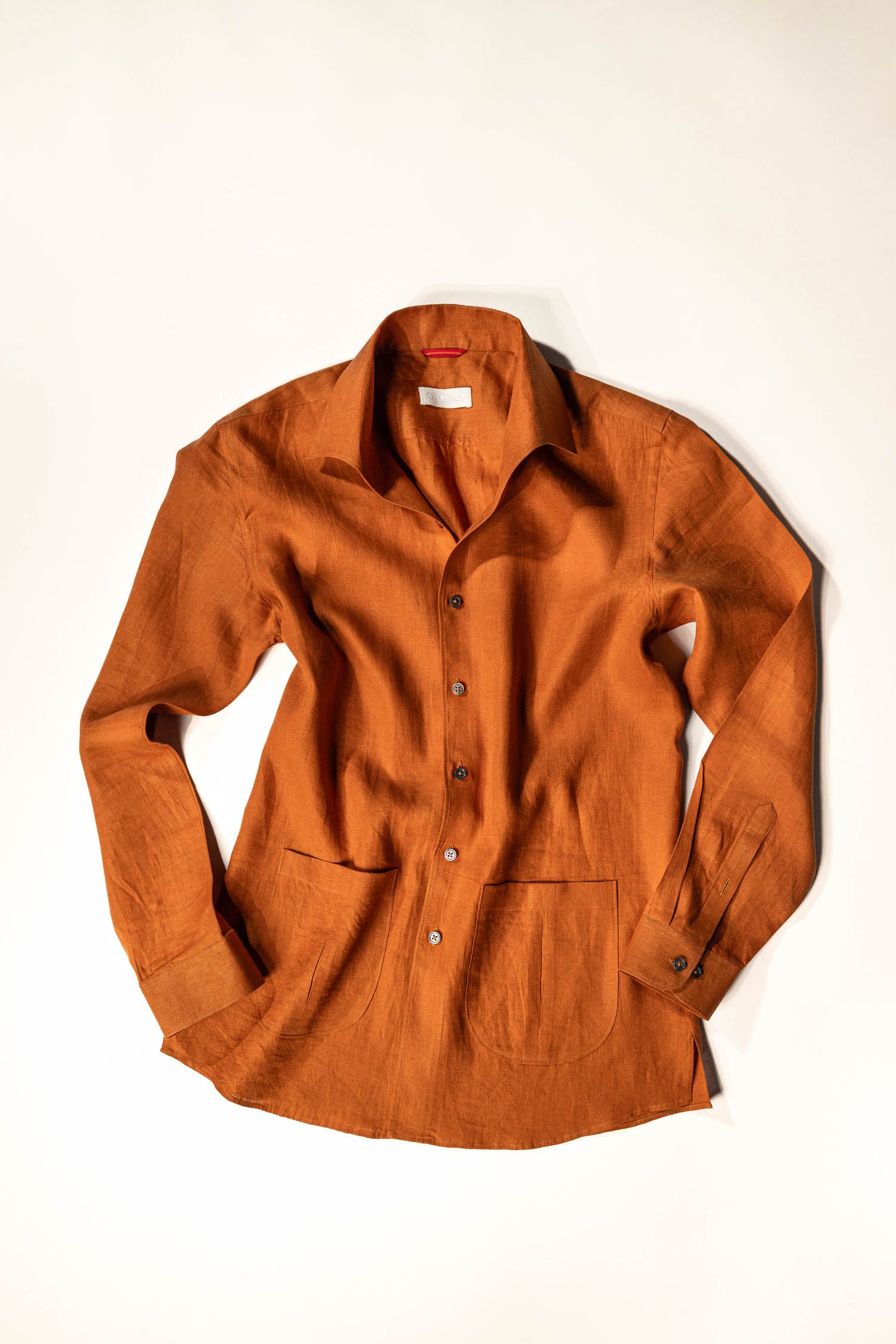 Osman Abdul Razak menswear Rust Linen Shirt with minimalist small collar and kurta inspired sleeve