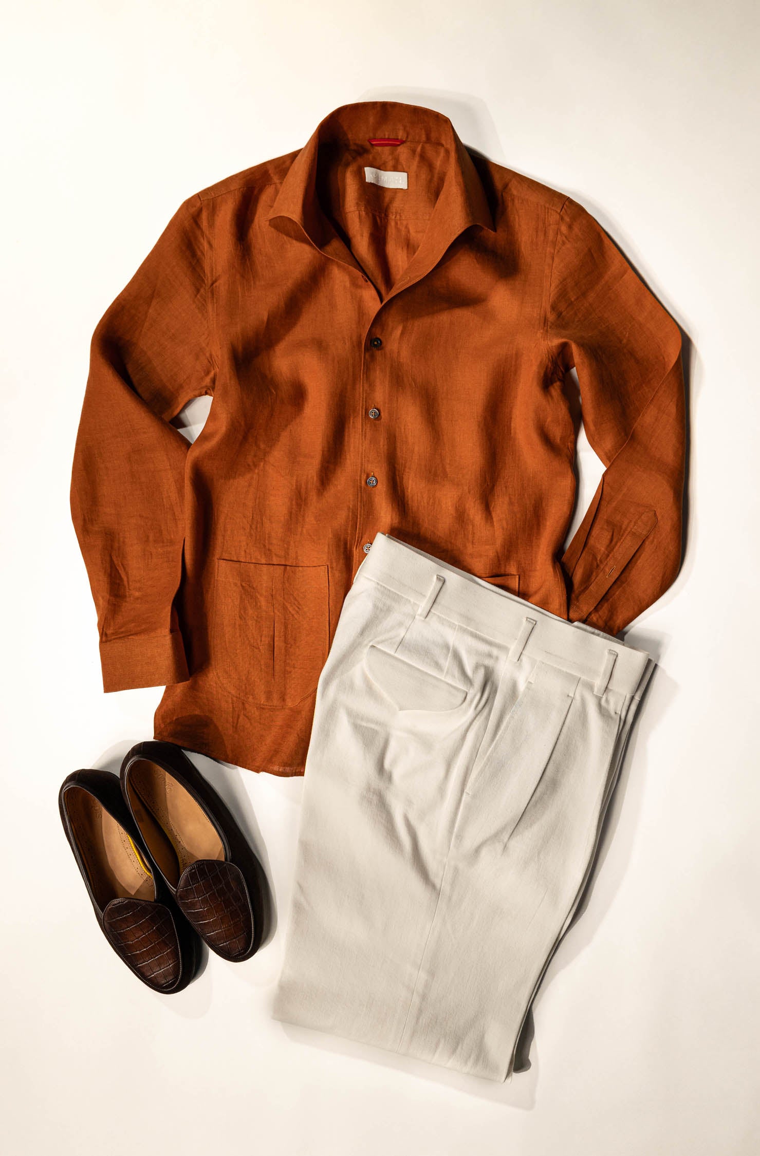 Osman Abdul Razak menswear Rust Linen Shirt designed for warm weather layering and breathable elegance
