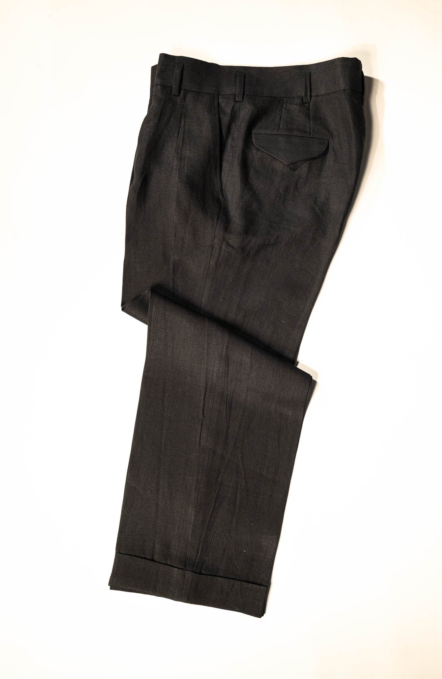 ailored menswear by Osman Abdul Razak – breathable black linen trouser for fluid, day-to-night elegance