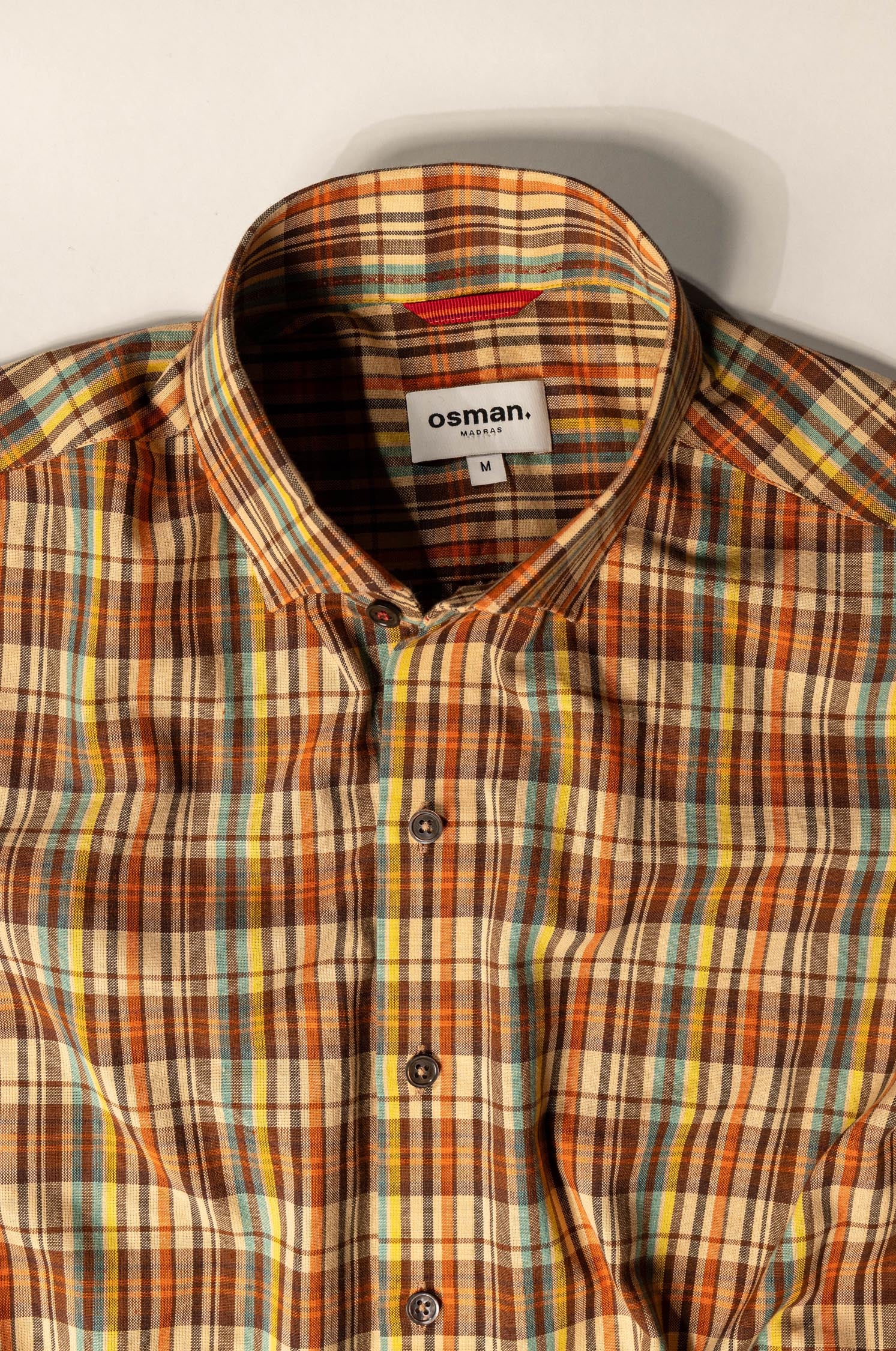 Osman Abdul Razak menswear – Madras Shirt with sleeve pleats, liberty cut, and one-piece collar